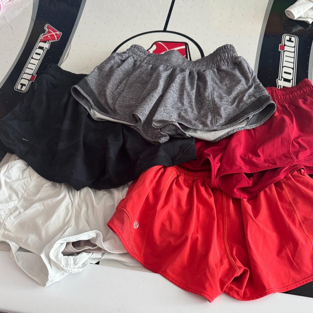 Set of lululemon mini hotty hot Shorts in Red, Gray, Black, and White